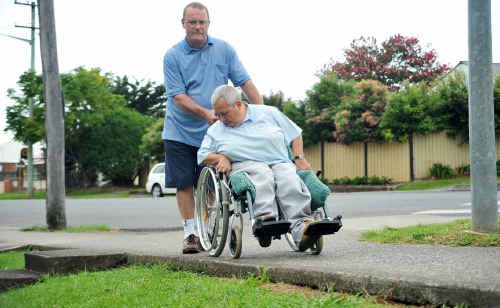 Eric and Sue Garvey find parts of West High St footpath dangerous for wheelchairs and motorised scooters. Eric and Sue Garvey find parts of West High St footpath dangerous for wheelchairs and motorised scooters.